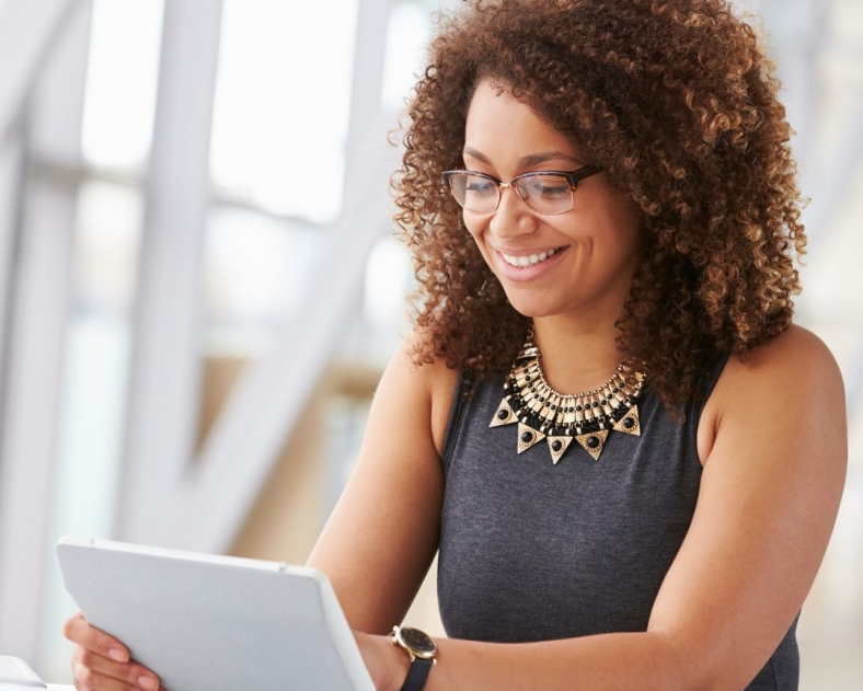 Archova - woman on tablet 1